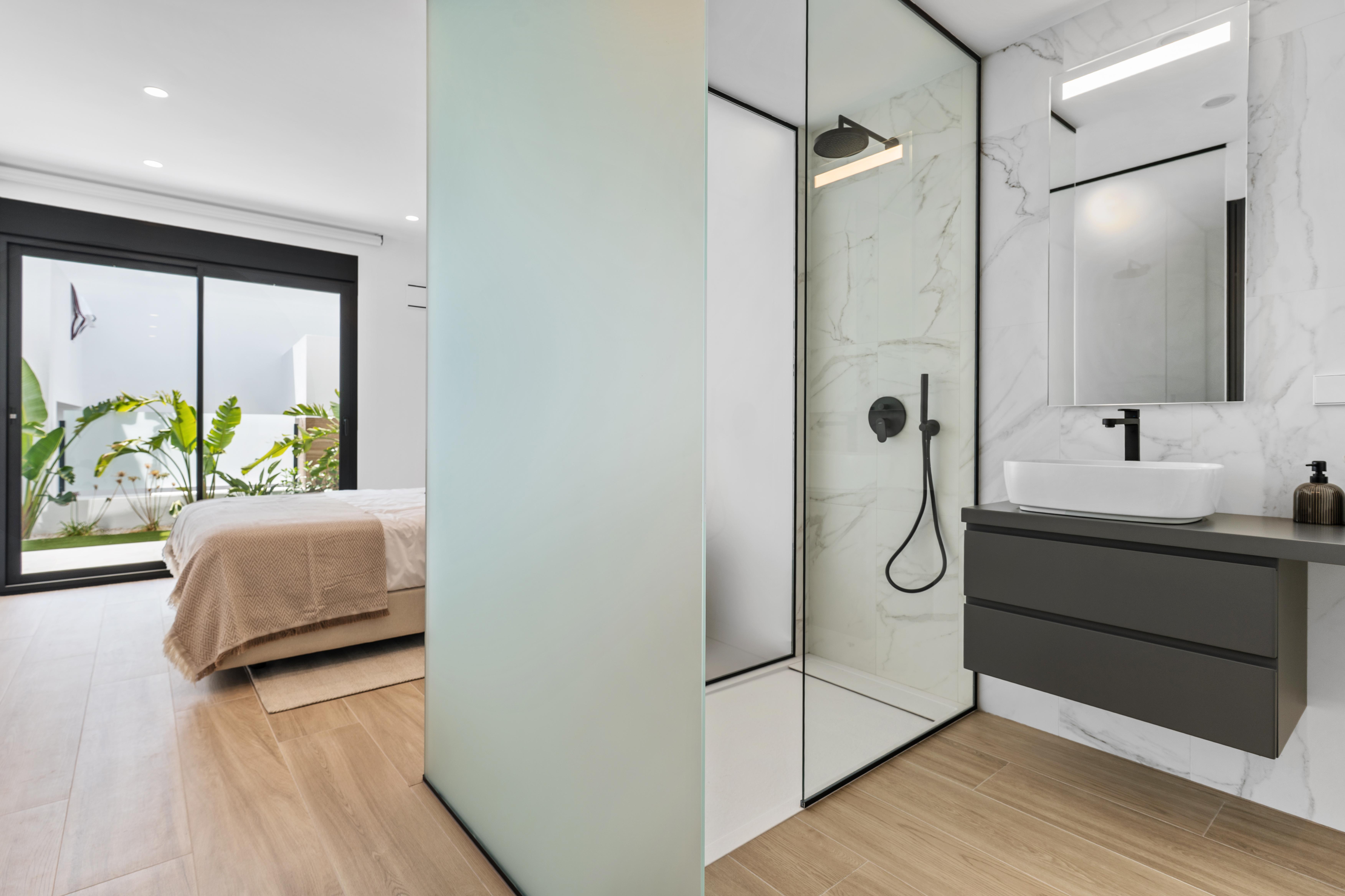 Appartement moderne de 2 chambres et 2 salles de bains avec terrasse-jardin.