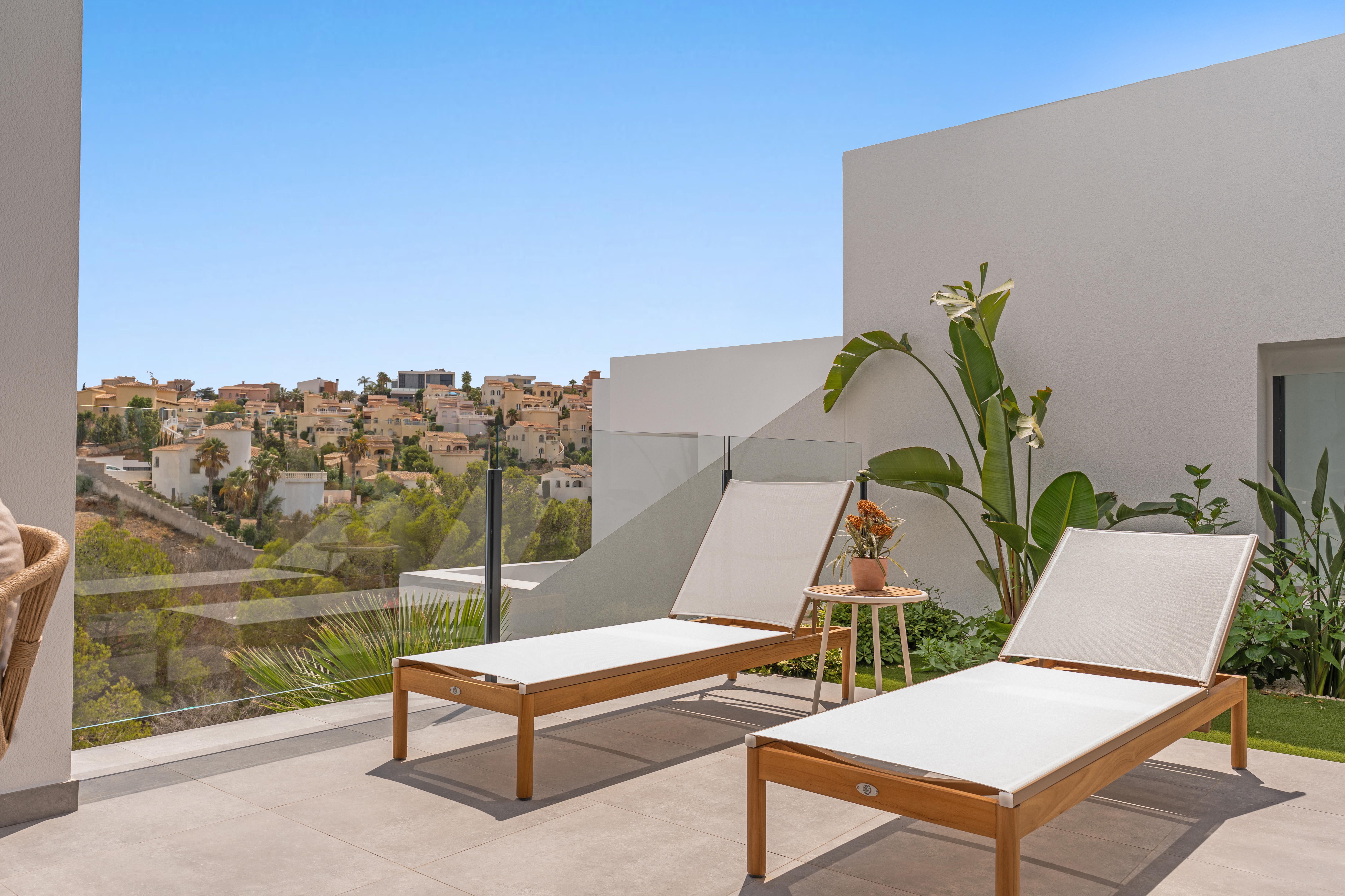 Appartement moderne de 2 chambres et 2 salles de bains avec terrasse-jardin.
